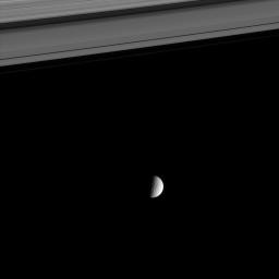 The dramatic Ithaca Chasma carves an enormous gash for more than 1,000 kilometers (620 miles) across Saturn's moon Tethys. This image was taken in visible light with NASA's Cassini spacecraft's narrow-angle camera.