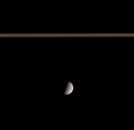 This color view from NASA's Cassini spacecraft shows two of the largest craters on Saturn's icy moon Tethys: Odysseus in the northern hemisphere and Melanthius in the south.