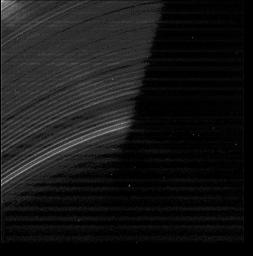 This view is part of a montage of images from NASA's Cassini and Voyager missions. This image shows the region between the D ring feature named D73 and the inner edge of the C-ring.