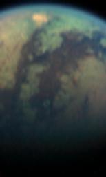 The visual and infrared mapping spectrometer instrument onboard NASA's Cassini spacecraft has found an unusual bright, red spot on Titan. This dramatic color (but not true color) image was taken during the April 16, 2005, encounter with Titan.