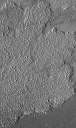NASA's Mars Global Surveyor shows the margins and front of a large lava flow located on the plains southeast of Ascraeus Mons in the Tharsis region of Mars. Tharsis is the site of the majority of martian volcanoes and lava flows. 