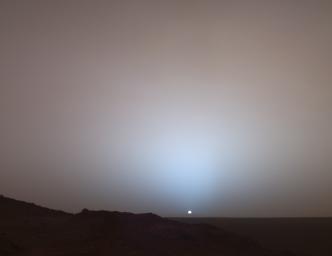 On May 19th, 2005, NASA's Mars Exploration Rover Spirit captured this stunning view as the Sun sank below the rim of Gusev crater on Mars. This Panoramic Camera (Pancam) mosaic was taken around 6:07 in the evening of the rover's 489th martian day.