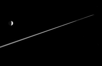 This perspective, from just beneath Saturn's ringplane, gives the rings a pointed appearance and captures a few clumps at the edge of the narrow F ring. This image was taken by NASA's Cassini spacecraft on Feb. 12, 2006.