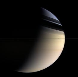 Dreamy colors ranging from pale rose to butterscotch to sapphire give this utterly inhospitable gas planet a romantic appeal. Shadows of the rings caress the northern latitudes whose blue color is presumed to be a seasonal effect as seen by NASA's Cassini