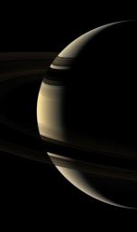 This moody true color portrait of Saturn shows a world that can, at times, seem as serene and peaceful as it is frigid and hostile. This image was acquired with NASA's Cassini spacecraft's wide-angle camera on Aug. 18, 2006.