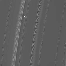 As NASA's Cassini watches the rings pass in front of the bright red giant star Aldebaran, the star's light fluctuates, providing information about the concentrations of ring particles within the various radial features in the rings.
