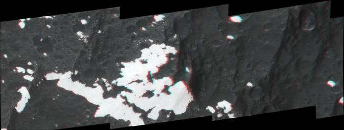 This anaglyph, shows huge mountains on Saturn's moon Iapetus, imaged by NASA's Cassini spacecraft during its very close flyby in Sept. 2007. 3D glasses are necessary to view this image.