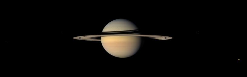 While on final approach for its Sept. 2007 close encounter with Saturn's moon Iapetus, NASA's Cassini spacecraft spun around to take in a sweeping view of the Saturn System.