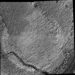 As NASA's Mars Exploration Rover Opportunity was traversing southward toward 'Victoria Crater' in May, 2006, it periodically stopping to characterize exposed bedrock, using the contact instrument suite on the robotic arm.