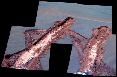 This false-color image taken on June 7, 2006, shows NASA's Mars Exploration Rover Opportunity's had become embedded within an unexpectedly deep and very fine-grained ripple, named 'Jammerbugt' and spent the next eight sols extricating itself.
