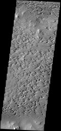 The power of the wind is evident in the erosion of this portion of the Medusae Fossae Formation on Mars as seen by NASA's Mars Odyssey spacecraft.