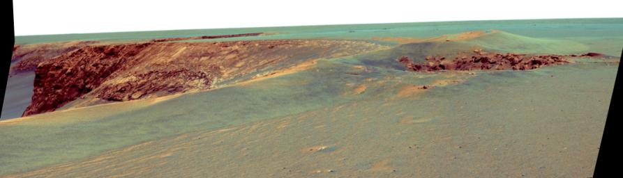 This false-color image taken on Sept. 28, 2006 from NASA's Mars Exploration Rover Opportunity, shows Victoria crater, looking southeast from Duck Bay towards the dramatic promontory called Cabo Frio.