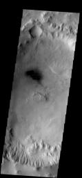 This image from NASA's Mars Odyssey spacecraft shows gullies on the southern rim of this unnamed crater in Terra Cimmeria on Mars.