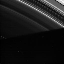 Saturn's shadow cloaks the faint D ring at the bottom of this image captured by NASA's Cassini spacecraft.