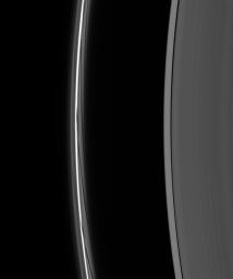 A close-up of the F ring shows dark gores in its interior faint ringlets following the passage of Prometheus. Each gore represents a single interaction of the moon with the F ring material as seen by NASA's Cassini spacecraft.