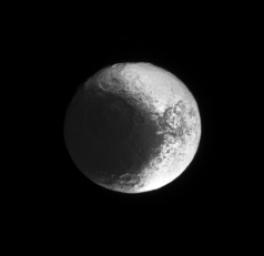NASA's Cassini spacecraft continues to image terrain on Iapetus that is progressively eastward of the terrain it has previously seen illuminated by sunlight.