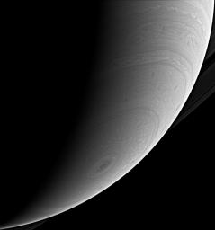 This beautiful look at Saturn south polar atmosphere, captured by NASA's Cassini spacecraft, shows the hurricane-like polar storm swirling there. Sunlight highlights its high cloud walls, especially around the 10 o'clock position.