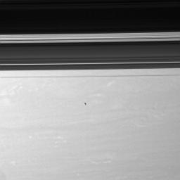 Epimetheus floats above Saturn's swirling skies in this image taken by NASA's Cassini spacecraft on June 1, 2007.