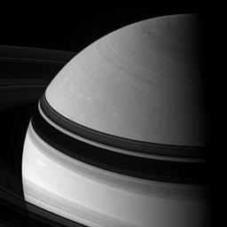 Incredible swirling details in Saturn's northern clouds can be seen in this dazzling view from NASA's Cassini spacecraft. Shadows cast by the rings embrace the northern hemisphere.