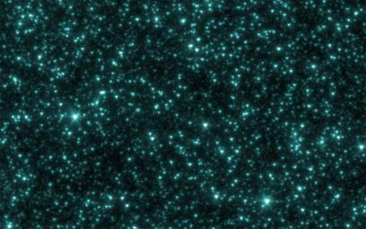 This is an image from NASA's Spitzer Space Telescope of stars and galaxies in the Ursa Major constellation. This infrared image covers a region of space so large that light would take up to 100 million years to travel across it. 