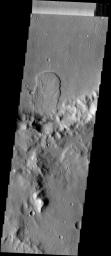 This landslide is located in an unnamed crater in Tyrrhena Terra on Mars as seen by NASA's Mars Odyssey spacecraft.