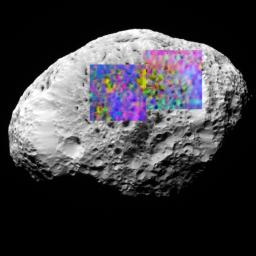 Hyperion, the eighth largest of Saturn's moons, is covered in craters and landslides. This color map shows the composition of a portion of Hyperion's surface determined with the Visual and Infrared Mapping Spectrometer aboard NASA's Cassini spacecraft.