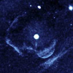 This enhanced image from the far-ultraviolet detector on NASA's Galaxy Evolution shows a ghostly shell of ionized gas around Z Camelopardalis, a binary, or double-star system featuring a collapsed, dead star known as a white dwarf, and a companion star.