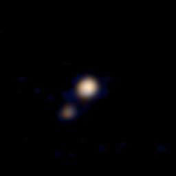 This image of Pluto and its largest moon, Charon, was taken by the Ralph color imager aboard NASA's New Horizons spacecraft on April 9 and downlinked to Earth the following day.