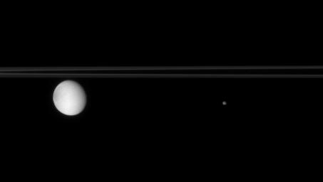 The two moons pictured here each share their orbits with other bodies; Dione and Epimetheus taken by NASA's Cassini spacecraft.