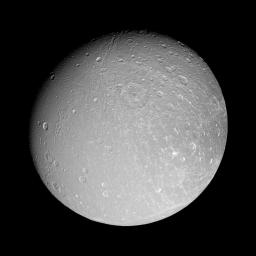 Canyons slink southward on Dione, while bright-walled craters gleam in the sun. This image was taken in polarized green light with NASA's Cassini spacecraft's narrow-angle camera on Sept. 30, 2007.