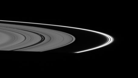 The fine, dust-sized particles of ice in the F ring and Encke Gap ringlets appear relatively bright, with the rings positioned almost directly between NASA's Cassini spacecraft and the Sun taken on Oct. 24, 2007.