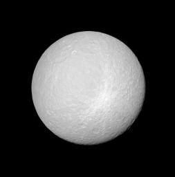 NASA's Cassini spacecraft views Rhea and the bright, rayed crater that is likely one of the younger features on the moon's surface.