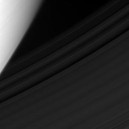 On Feb. 5, 2008, NASA's Cassini spacecraft viewed the gauzy C ring of Saturn, with the cloud-streaked planet providing a dramatic backdrop.