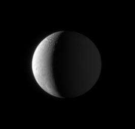 NASA's Cassini spacecraft acquired this view 15 hours before closest approach to Enceladus as the spacecraft dove toward its thrilling March 2008 encounter with the ice-particle-spewing moon.