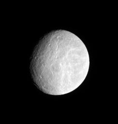 Densely cratered plains cover the ancient surface of Saturn's moon Rhea. This image was taken in visible light with NASA's Cassini spacecraft's narrow-angle camera on April 4, 2008.