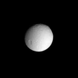 The enormous impact basin Odysseus sits on the eastern limb of Saturn's icy moon Tethys. This image was taken with NASA's Cassini spacecraft's narrow-angle camera on April 14, 2008.