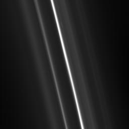 On May 10, 2008, NASA's Cassini spacecraft captured multiple tenuous strands flank the brilliant core of Saturn's F ring. These delicate, flanking ringlets wind through the F ring, creating a tight spiral.
