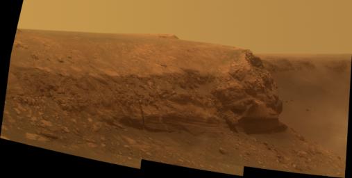 A promontory nicknamed Cape Verde can be seen jutting out from the walls of Victoria Crater in this true-color picture taken by NASA's Mars Exploration Rover Opportunity on Oct. 20, 2007.