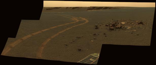 This image from NASA's Mars Exploration Rover Opportunity taken on May 1, 2007 shows parallel tracks left by earlier drives nearer to the northern rim of Victoria crater.