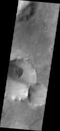 This image from NASA's Mars Odyssey shows a crater and its dune field located in southern Noachis Terra.