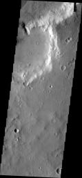 This image from NASA's Mars Odyssey shows a deep channel between two unnamed craters in Xanthe Terra. A fan/delta has formed at the lower end of the channel.