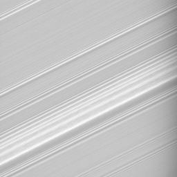 This high-resolution view from NASA's Cassini spacecraft, taken on July 21, 2008, shows incredible detail within a spiral density wave within Saturn's A ring.