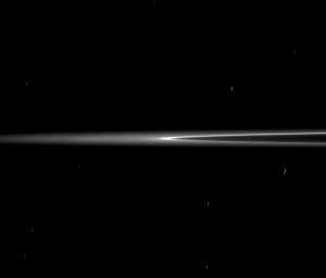 The bright arc of material in Saturn's G ring is seen here as it rounds the ring's edge, or ansa. The ring arc orbits Saturn along the inner edge of the G ring. This image was captured by NASA's Cassini spacecraft on Aug. 22, 2008.