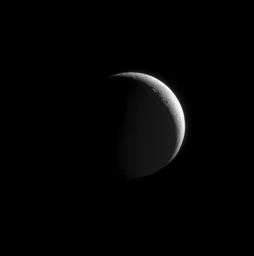 Northern craters line the crescent of Enceladus. This image from NASA's Cassini spacecraft is part of an observation designed to view the moon's plume of icy particles at a moderately high phase angle.