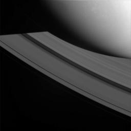 Saturn's shadow cuts across the rings in this view from high above the ringplane in this image captured by NASA's Cassini spacecraft on Oct. 18, 2008.
