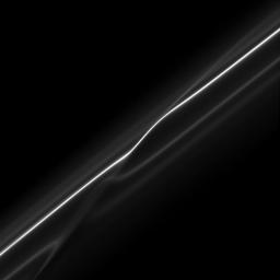 In this image from NASA's Cassini spacecraft of the F ring, taken shortly after its ring particles encountered the shepherd moon Prometheus, the disruption to the ring caused by the moon is evident.
