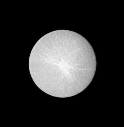 A bright ray crater dominates this view of the leading hemisphere of Rhea, obtained at a time when the Sun was nearly aligned behind NASA's Cassini spacecraft, or 'opposition.'