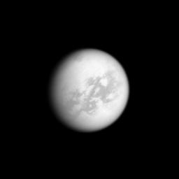 Almost the entire disk of Titan is illuminated by the sun in this low-phase image of Saturn's largest moon. With the sun behind NASA's Cassini spacecraft, the camera can clearly see the dark Senkyo region and the bright area south of the equator.