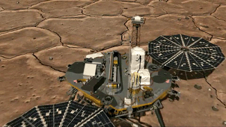 This artist's image of an imaginary camera zooming in from above shows the location of the Robotic Arm Camera on NASA's Phoenix Mars Lander as it acquires an image of the scoop at the end of the arm.