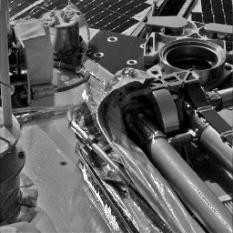 This image from NASA's Phoenix Mars Lander's Stereo Surface Imager (SSI) taken on Sol 3. It shows the stair-step motion used to unstow the arm from a protective covering called the biobarrier.